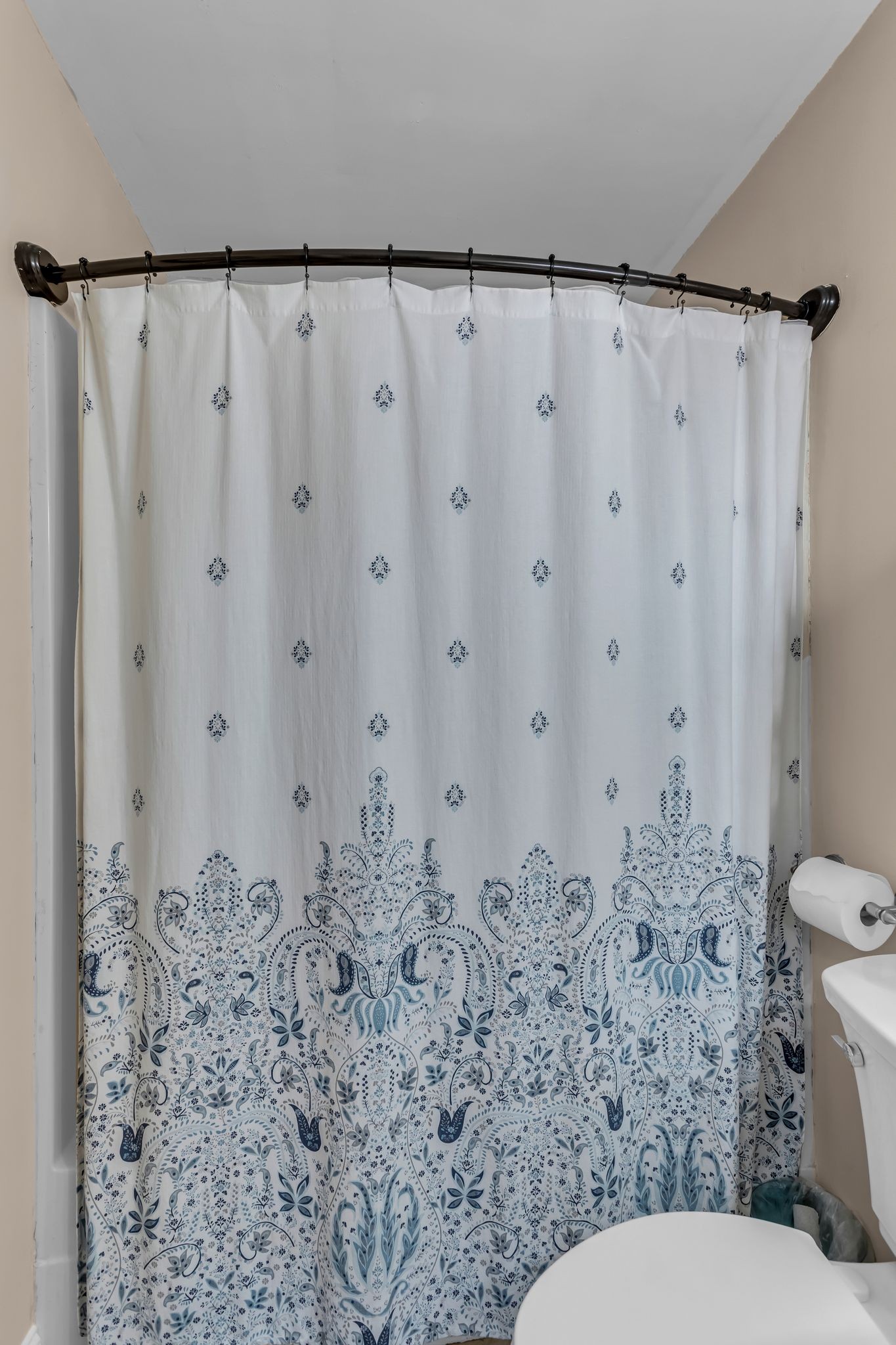 116 Jackson Street Mount Pleasant, TN 38474 - Photo 22 of 27 a bathroom with a toilet and a shower curtain