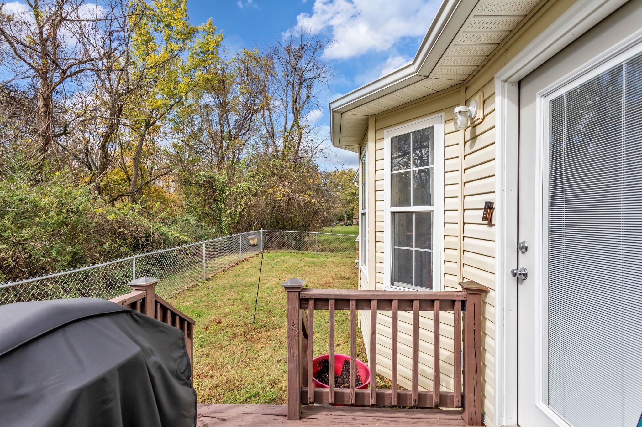 116 Jackson Street Mount Pleasant, TN 38474 - Photo 24 of 27 a view of roof deck with large tree and wooden fence