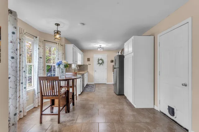 a view of kitchen with dining area