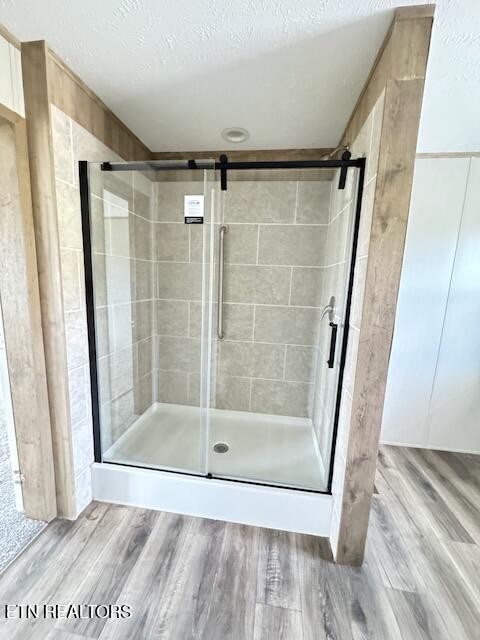 145 Mulberry Road Greeneville, TN 37745 - Photo 18 of 50 a bathroom with a glass door shower and vanity