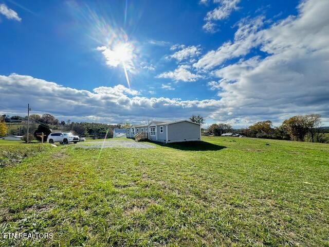 145 Mulberry Road Greeneville, TN 37745 - Photo 36 of 50 a view of a house with a big yard