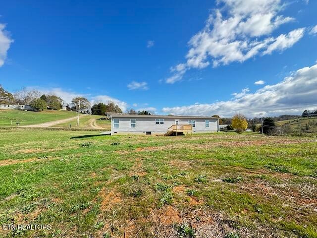 145 Mulberry Road Greeneville, TN 37745 - Photo 41 of 50 a view of a big yard with swimming pool and large trees
