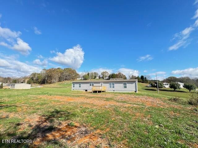 145 Mulberry Road Greeneville, TN 37745 - Photo 42 of 50 a view of a big yard with a house in the background
