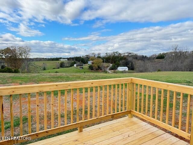 145 Mulberry Road Greeneville, TN 37745 - Photo 49 of 50 a view of a wooden deck with a yard
