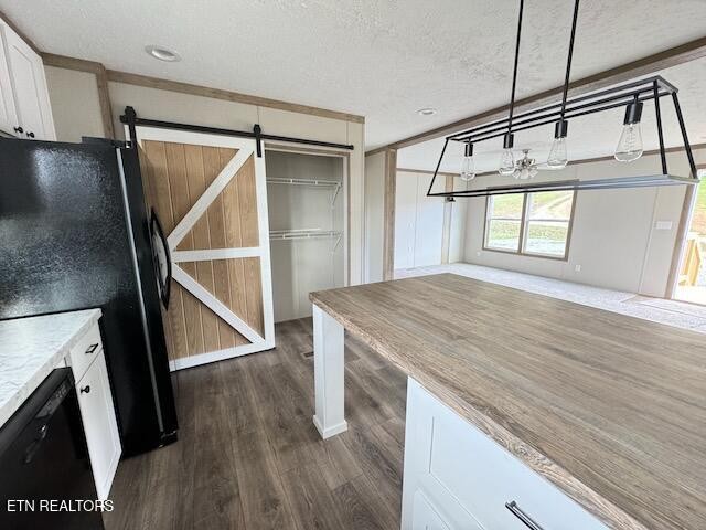 145 Mulberry Road Greeneville, TN 37745 - Photo 6 of 50 a view of a kitchen with a sink and wooden floor