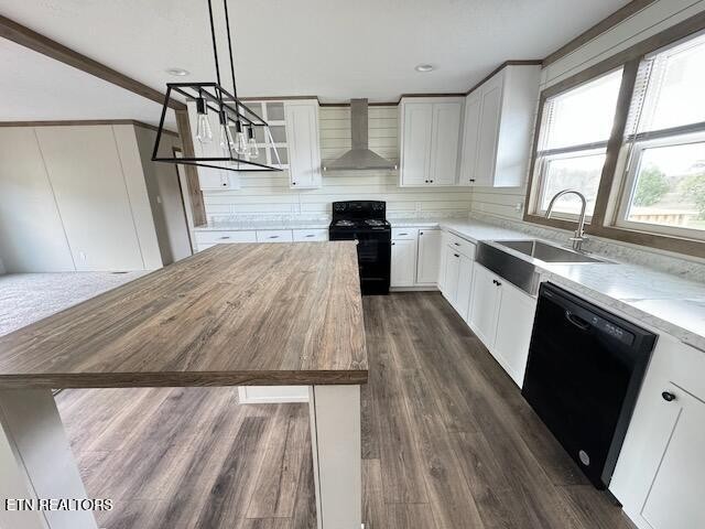 145 Mulberry Road Greeneville, TN 37745 - Photo 8 of 50 a kitchen with a sink a wooden floor and a window