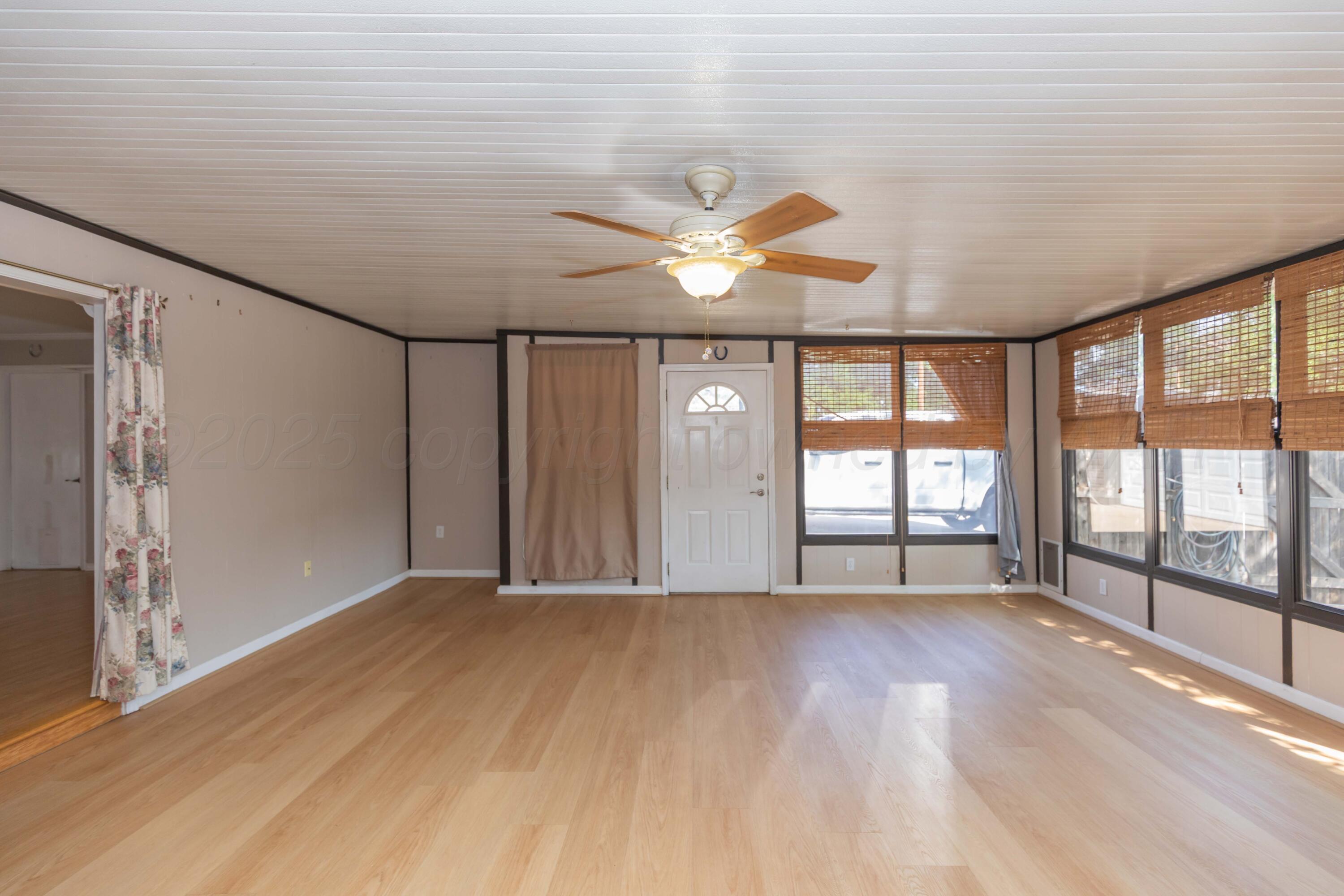 7000 Sunburst Street Amarillo, TX 79110 - Photo 27 of 32 a view of an empty room with a window