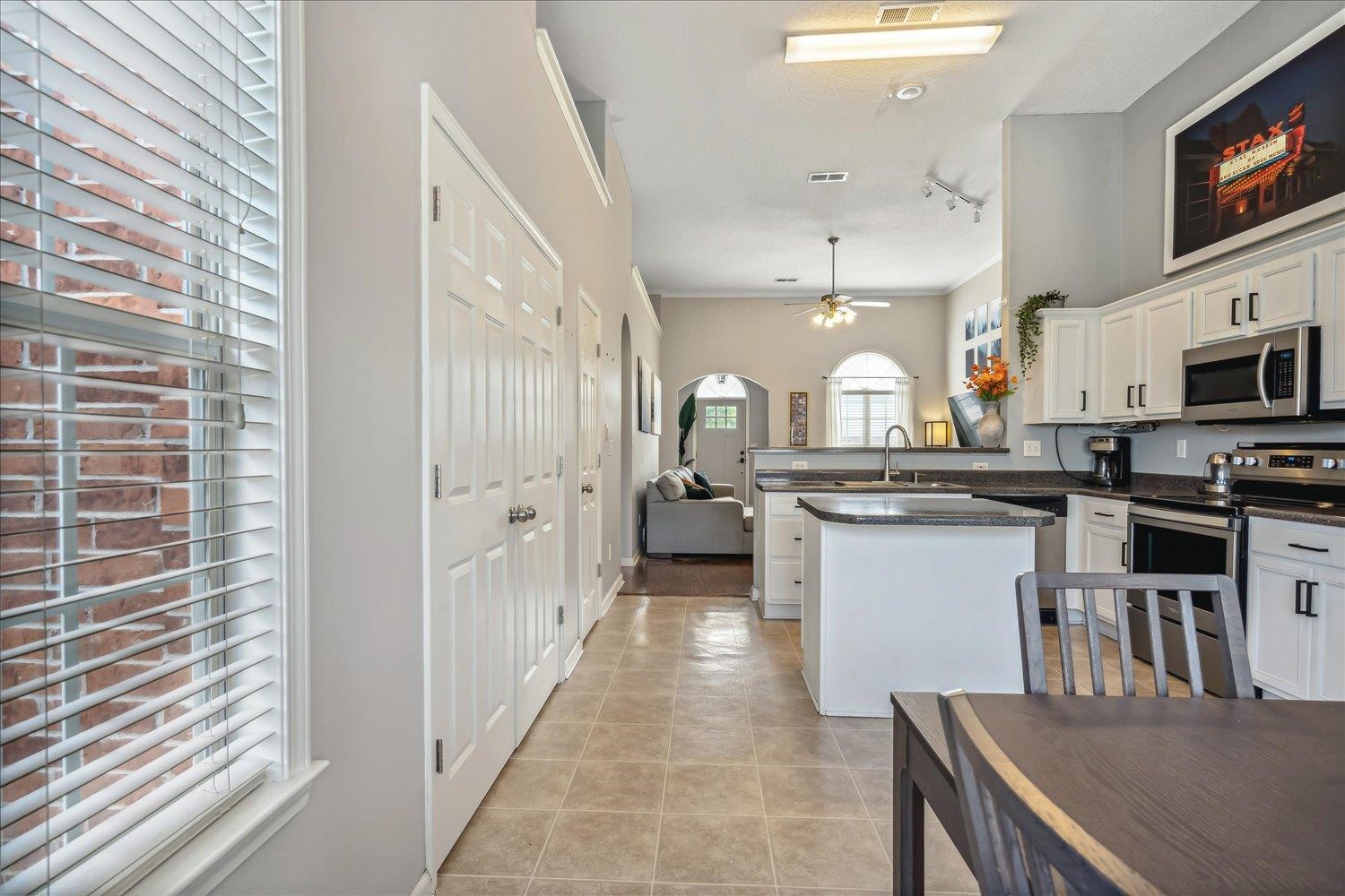 5003 Will Fall Lane Bartlett, TN 38002 - Photo 13 of 26 a kitchen with a refrigerator and a sink