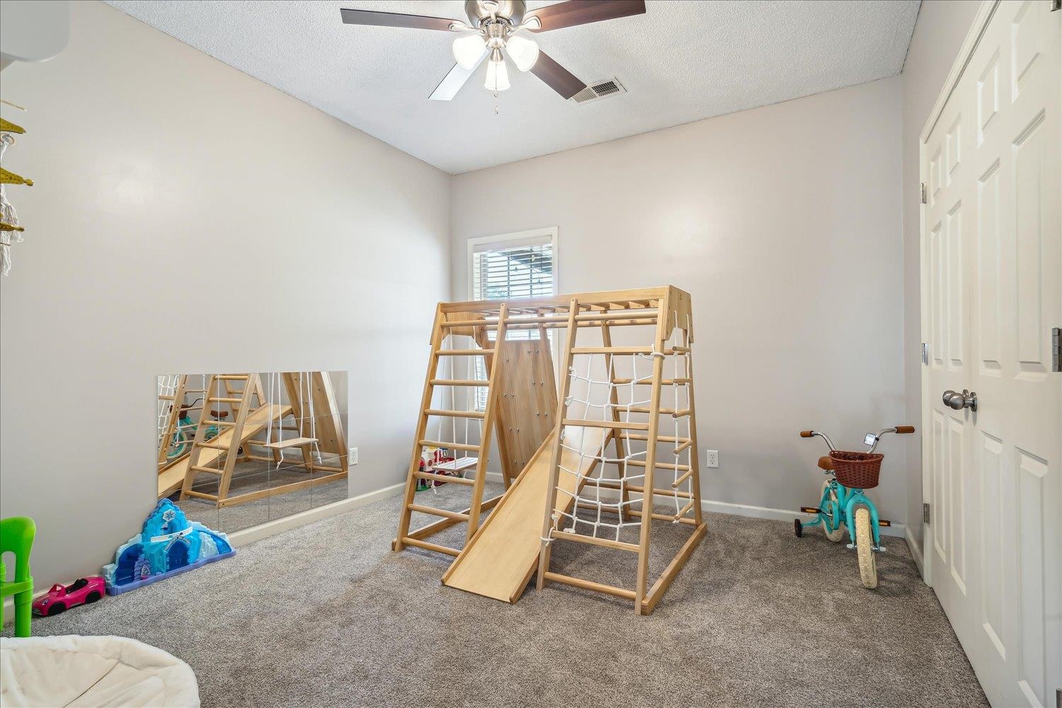 5003 Will Fall Lane Bartlett, TN 38002 - Photo 17 of 26 a view of a room with gym equipment
