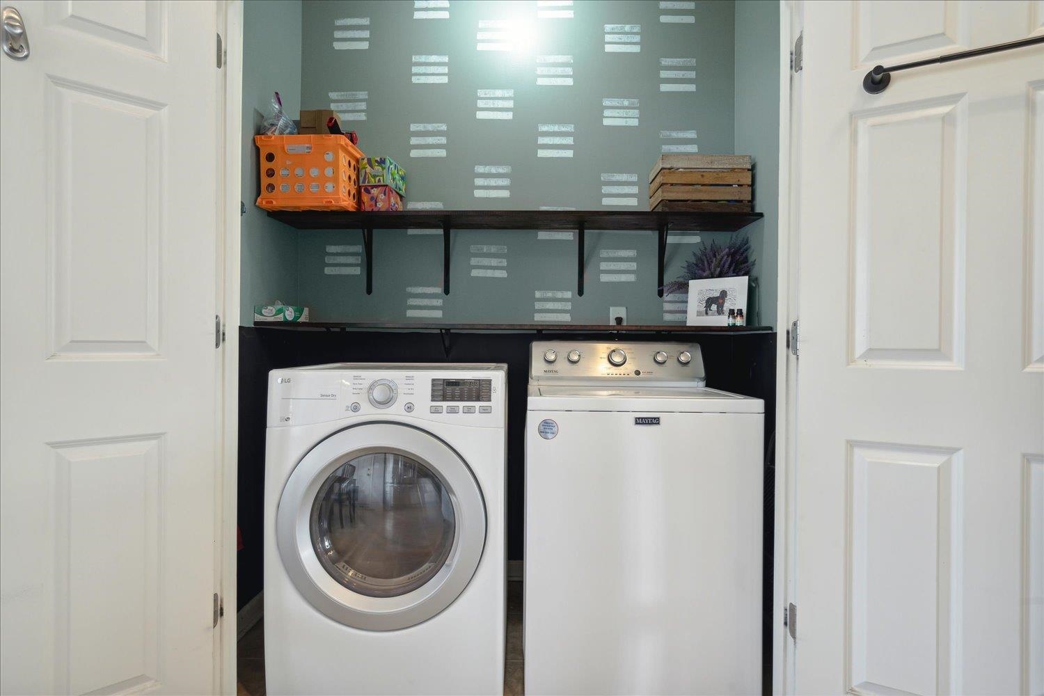 5003 Will Fall Lane Bartlett, TN 38002 - Photo 20 of 26 a view of a hallway with washer and dryer