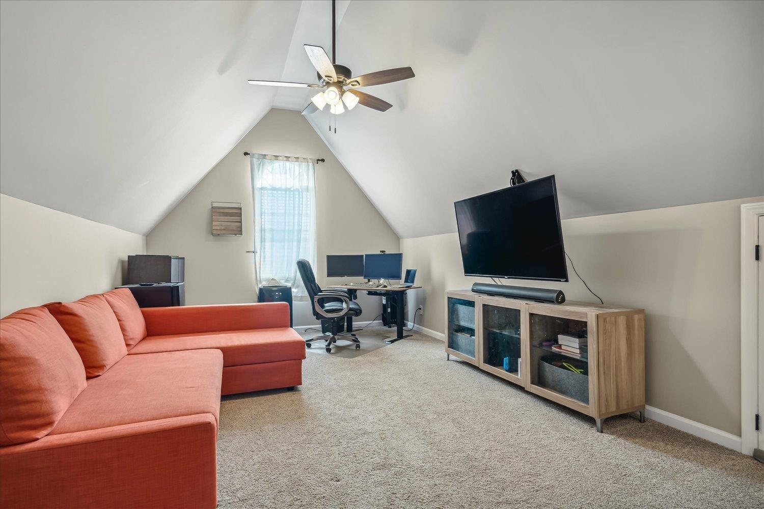 5003 Will Fall Lane Bartlett, TN 38002 - Photo 21 of 26 a living room with furniture and a flat screen tv