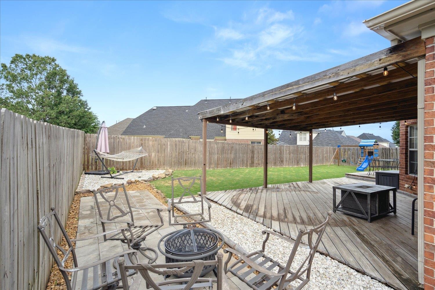 5003 Will Fall Lane Bartlett, TN 38002 - Photo 24 of 26 a patio with table and chairs