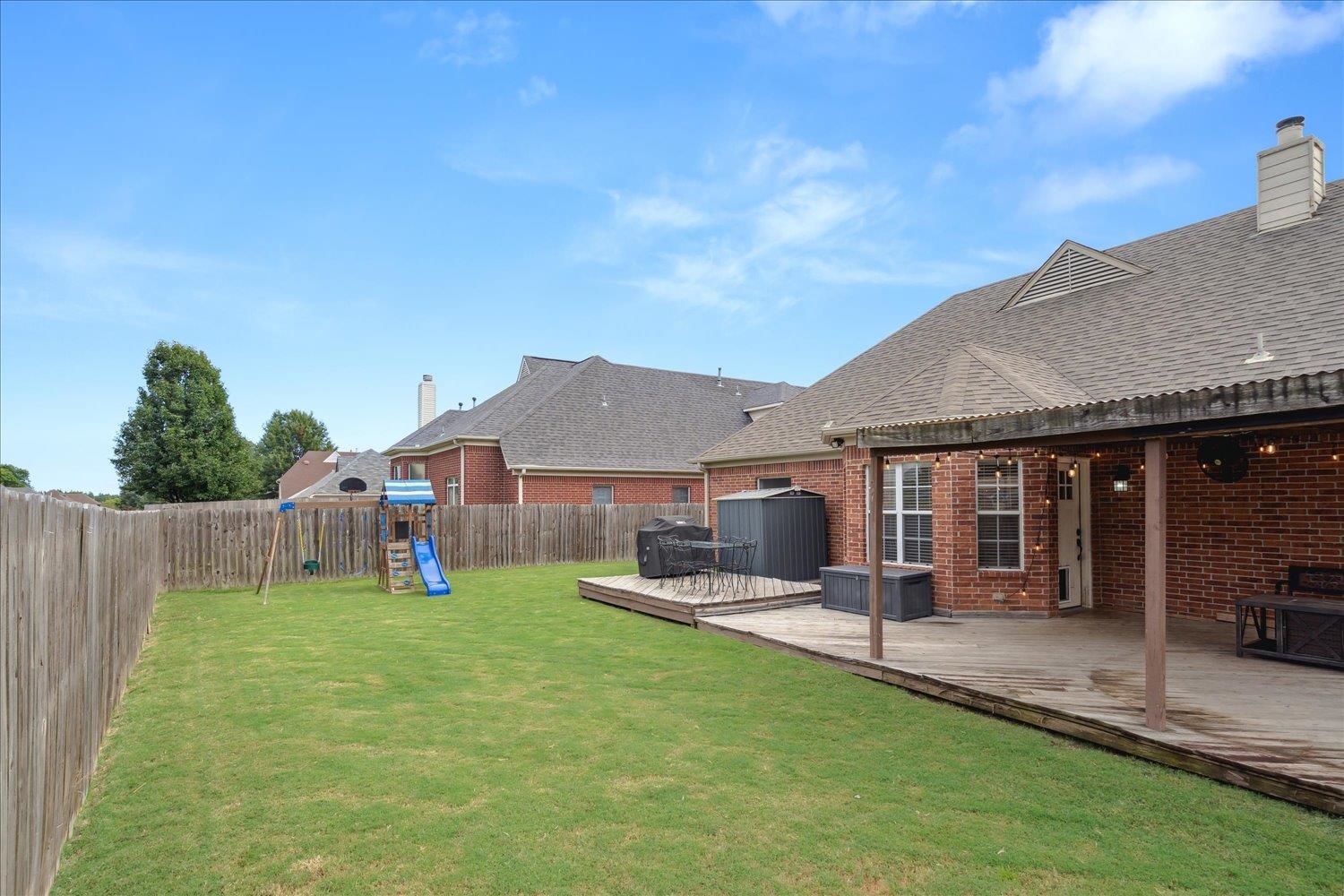 5003 Will Fall Lane Bartlett, TN 38002 - Photo 25 of 26 a view of a house with a yard and sitting area