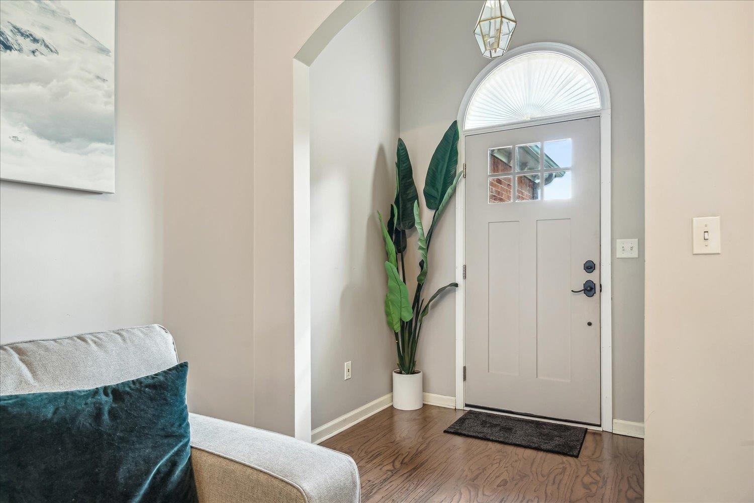 5003 Will Fall Lane Bartlett, TN 38002 - Photo 5 of 26 an entryway with wooden floor and a rug