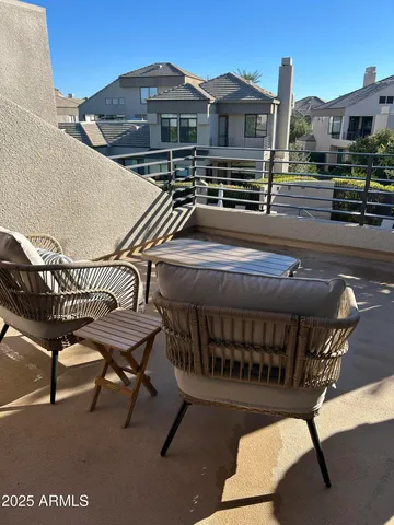 a view of storage and utility room with wooden floor