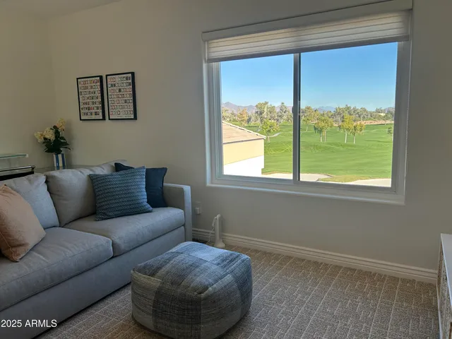 a view of storage and utility room with washer and dryer