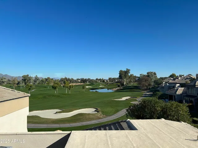 a living room with furniture and flat screen tv
