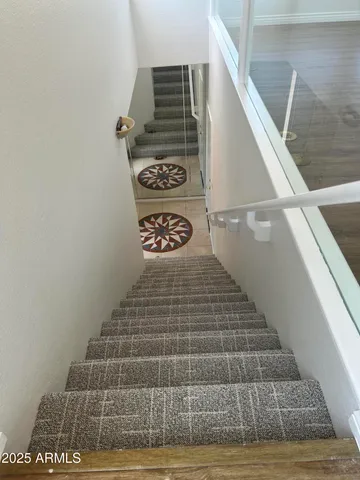 a view of a dining room with furniture and window