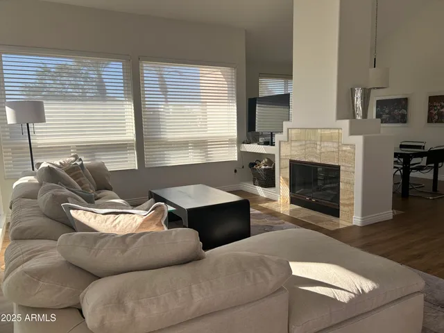 a view of a dining room with furniture and window