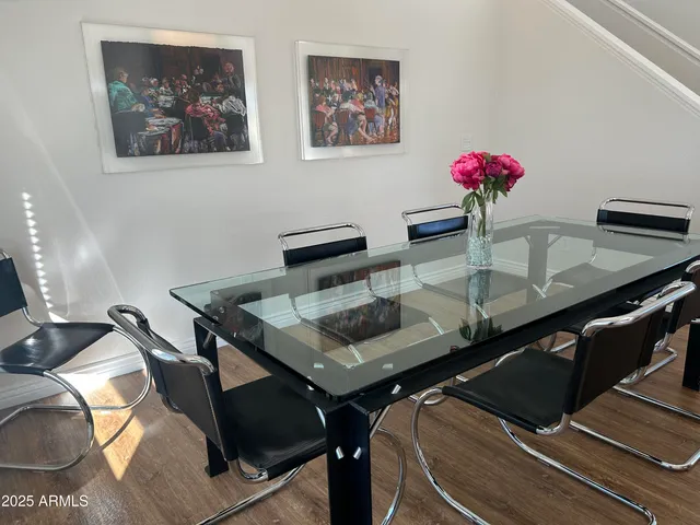 a view of a chairs and table on the terrace