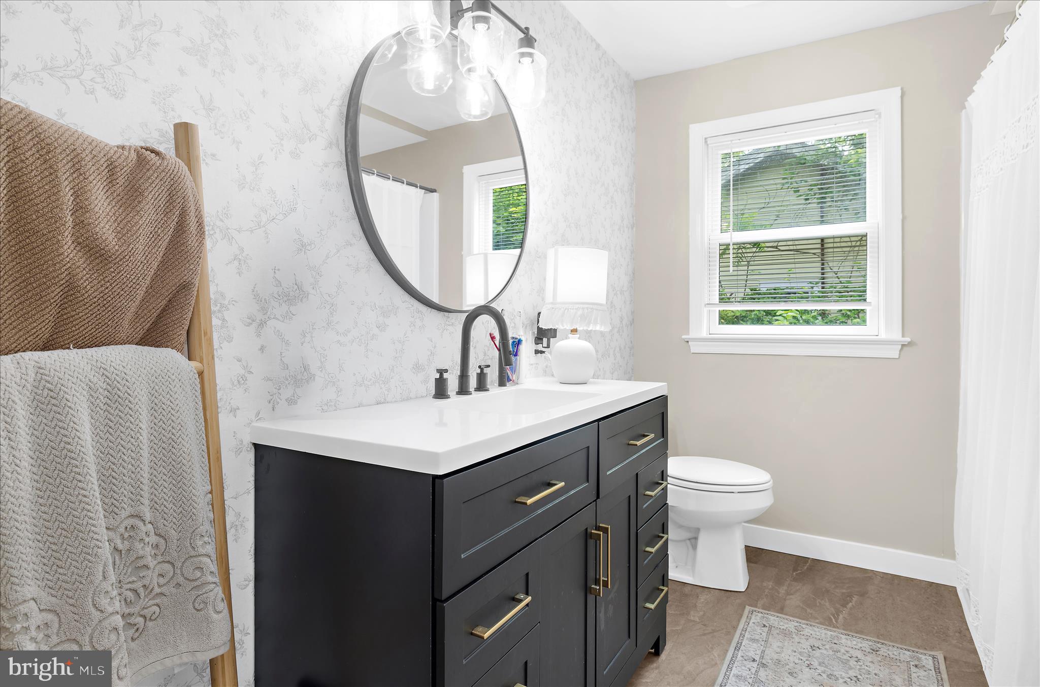 11994 Cordova Road Cordova, MD 21625 - Photo 14 of 57 a bathroom with a toilet sink and mirror