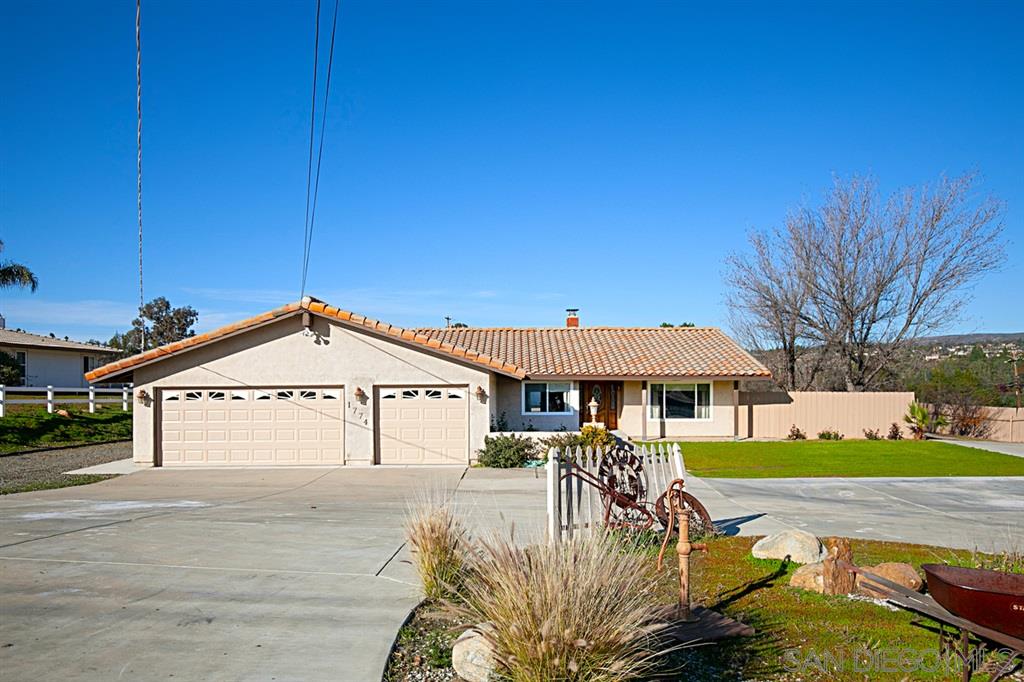 1774 Roble Grande Road Alpine, CA 91901 - Photo 2 of 25 Large circular driveway and with easy access to rear yard, Guest House, carport and RV Hookups!