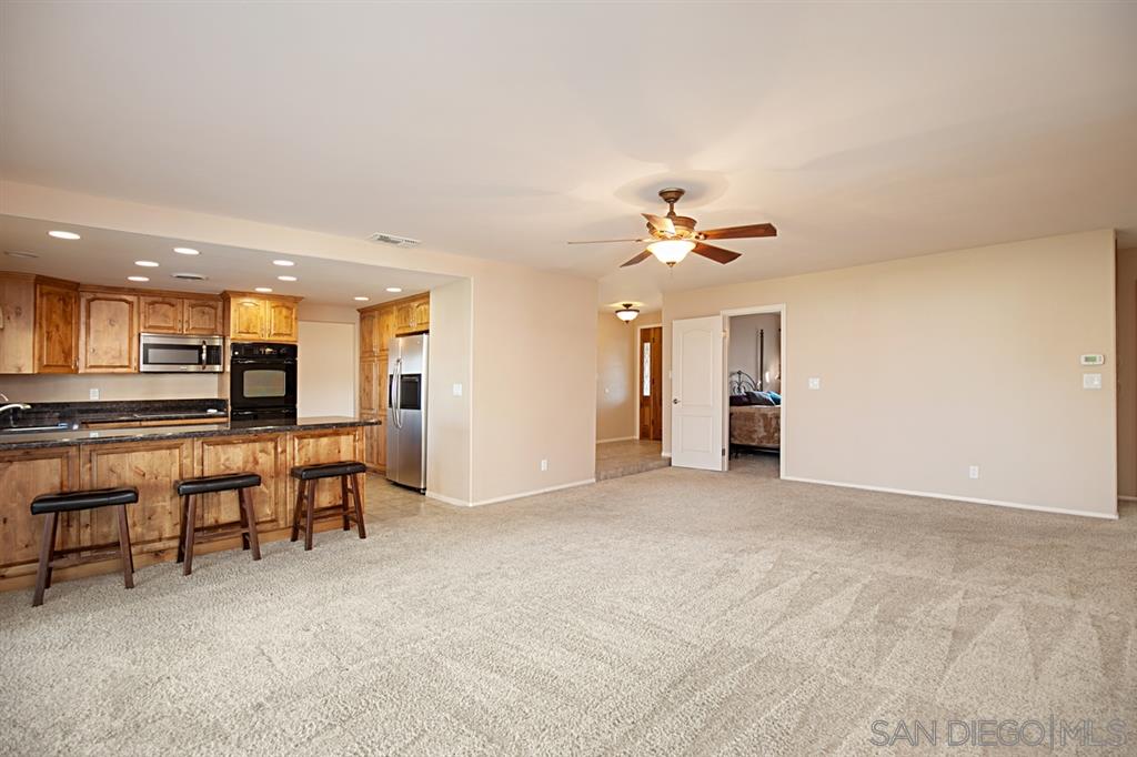 1774 Roble Grande Road Alpine, CA 91901 - Photo 25 of 25 Open floor plan & family room features a wet bar.