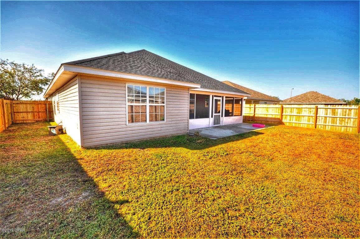 2905 Cedars Crossing Panama City, FL 32405 - Photo 6 of 11 a house view with swimming pool and porch