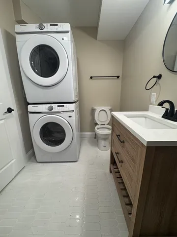 a utility room with dryer and washer