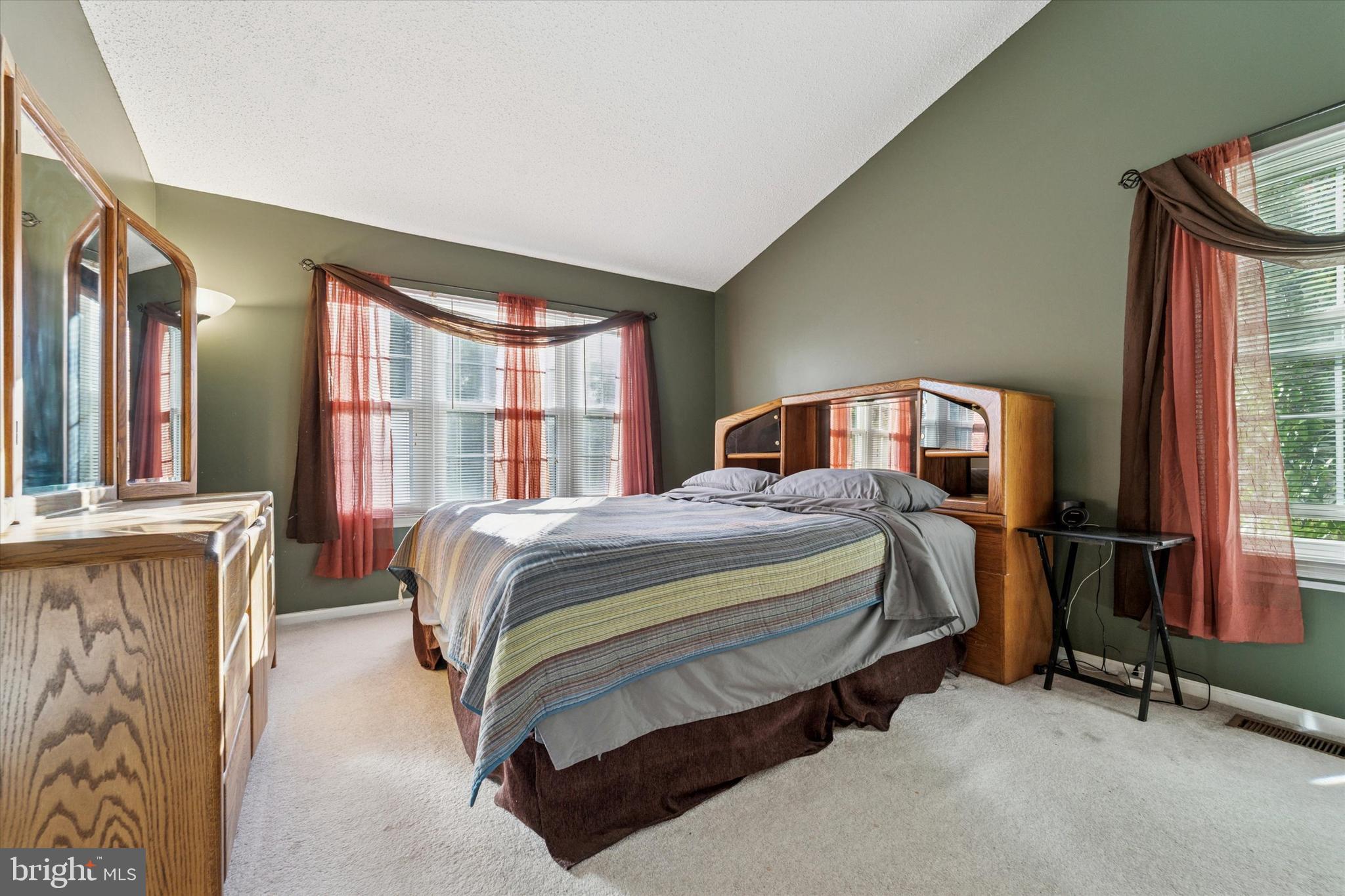 31 Ashley Court, Unit 31 Glen Mills, PA 19342 - Photo 12 of 19 a bedroom with a bed chair and window