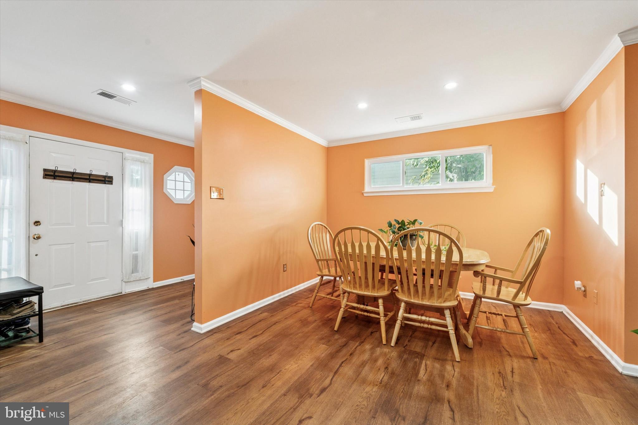 31 Ashley Court, Unit 31 Glen Mills, PA 19342 - Photo 8 of 19 a view of a dining room with furniture and wooden floor