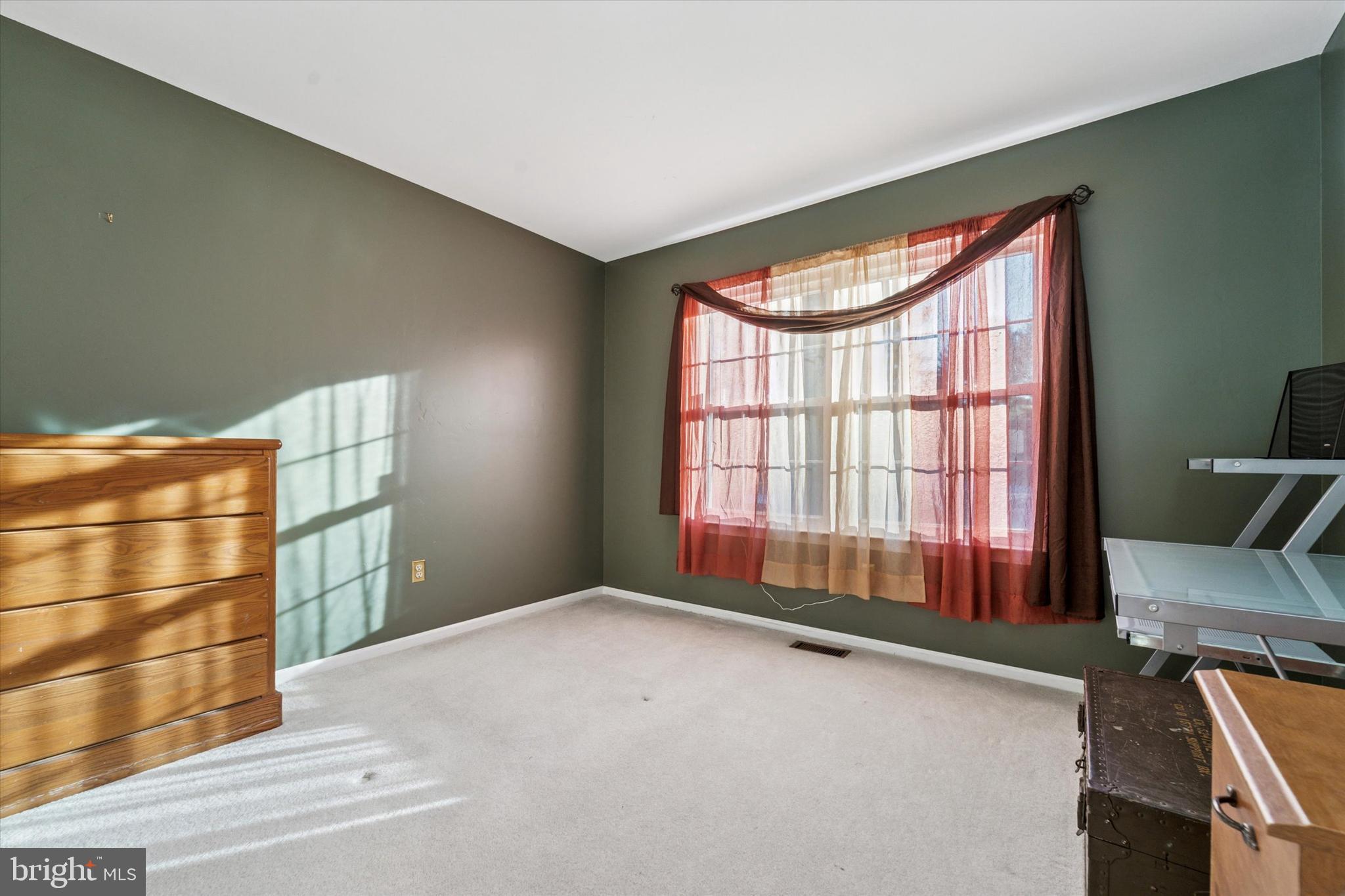 31 Ashley Court, Unit 31 Glen Mills, PA 19342 - Photo 10 of 19 a view of an empty room with a window