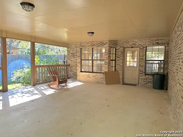 an empty room with entrance door