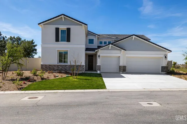 a living room with furniture a flat screen tv and a window