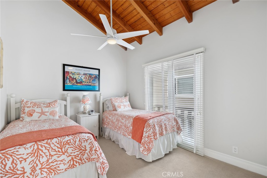 112 Abalone Avenue Newport Beach, CA 92662 - Photo 19 of 25 a bedroom with two beds and a window