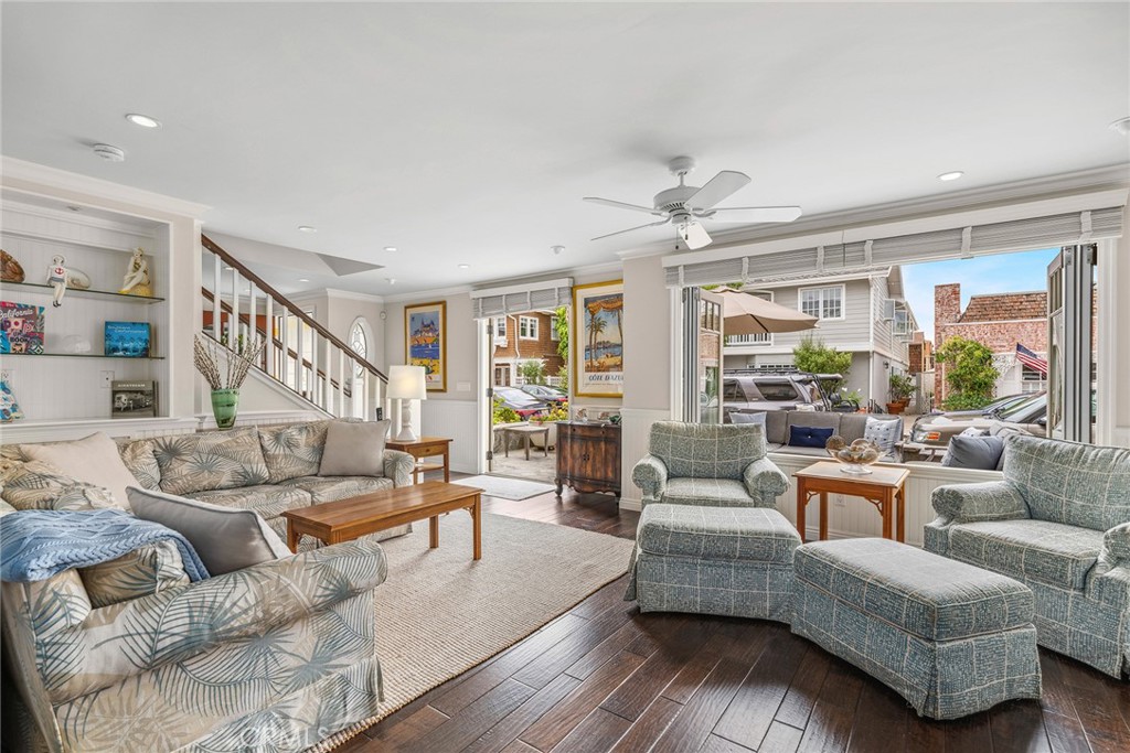 112 Abalone Avenue Newport Beach, CA 92662 - Photo 7 of 25 a living room with furniture and a large window