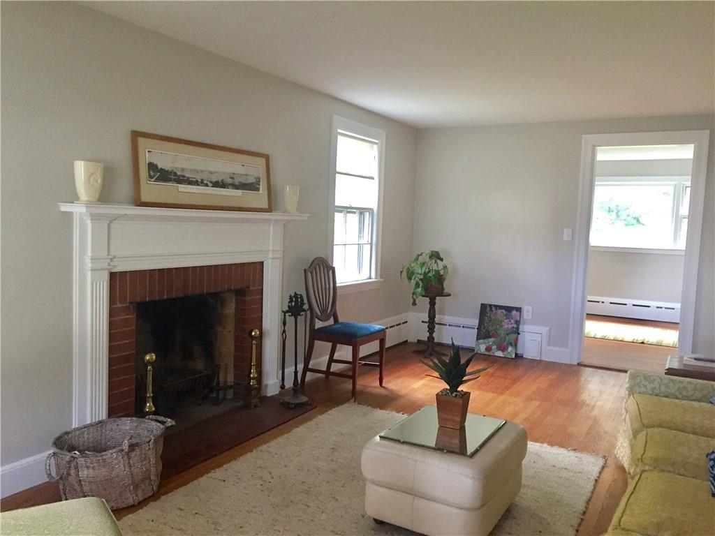 49 Strathmore Road South Portland, ME 04106 - Photo 8 of 23 Living room with fireplace.