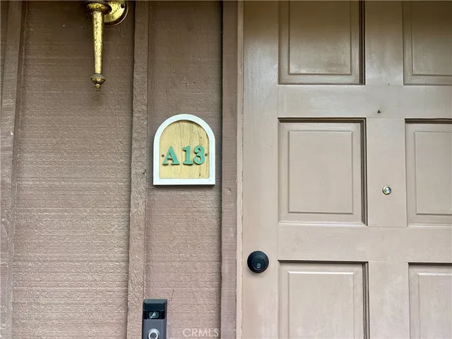 a bathroom with a granite countertop window and a shower