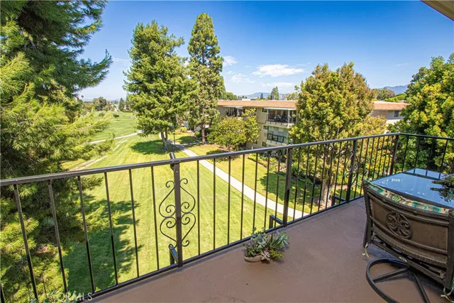 a view of balcony with furniture