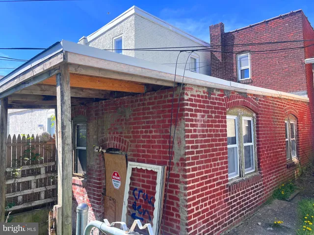 a front view of a building with glass windows