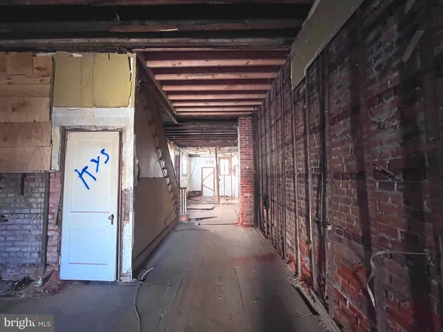 a view of a hallway with entryway