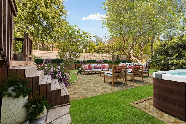 a view of a garden with patio