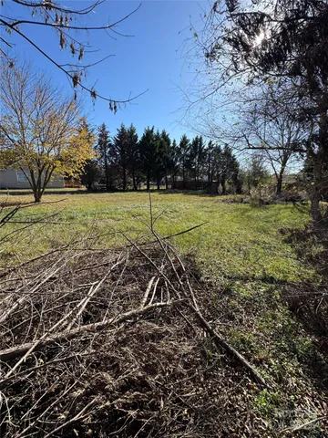 workspace with wooden floor and windows