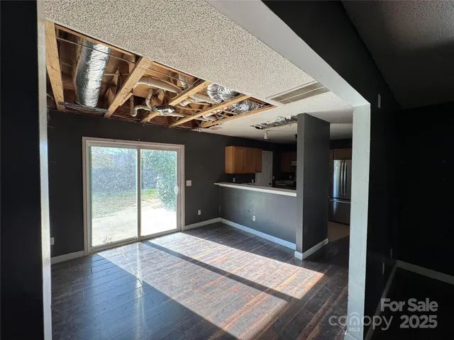 a utility room with a sink a washer and dryer