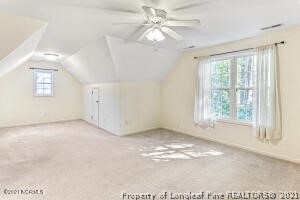 Undisclosed Address Pinehurst, NC 28374 - Photo 25 of 29 a view of an empty room with a window