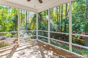 Undisclosed Address Pinehurst, NC 28374 - Photo 26 of 29 a view of a balcony with green trees