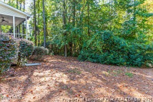 Undisclosed Address Pinehurst, NC 28374 - Photo 29 of 29 a view of a backyard with large trees