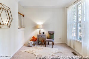 Undisclosed Address Pinehurst, NC 28374 - Photo 5 of 29 a room with furniture and a lamp