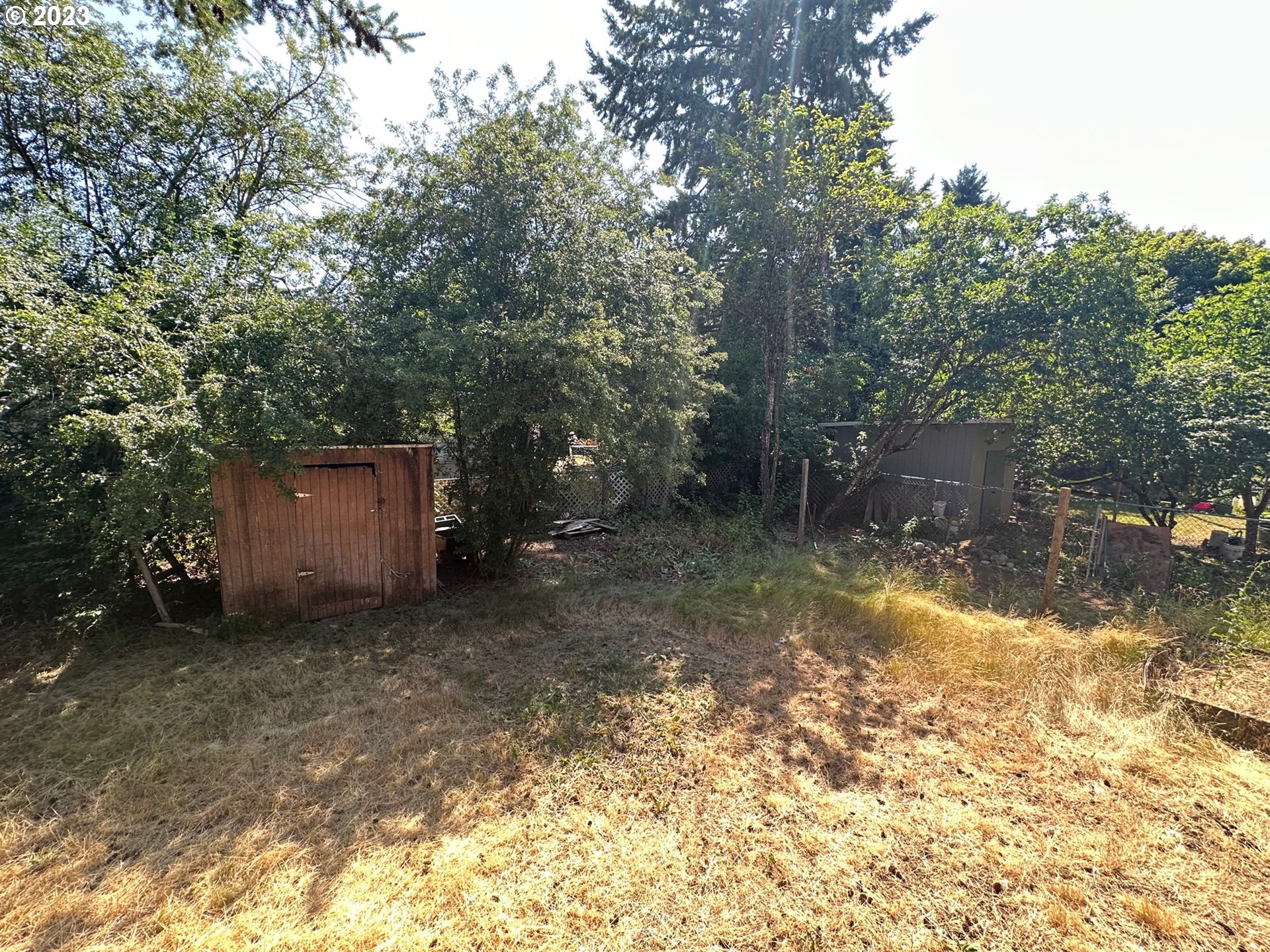 13922 Southeast Bush Street Portland, OR 97236 - Photo 26 of 29 a backyard of a house