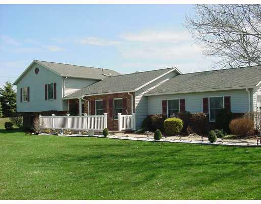 201 Powell Road New Brighton, PA 15066 - Photo 1 of 16 Exterior Front. Sit on the front porch and enjoy the view and privacy this home has to offer.